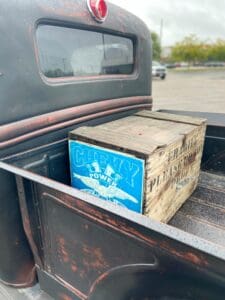 A box sitting in the back of a truck.