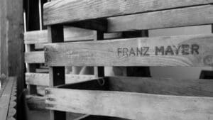 A black and white photo of a wooden crate.