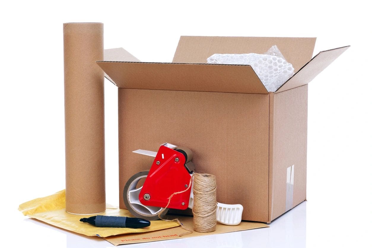 A cardboard box with some tape and papers